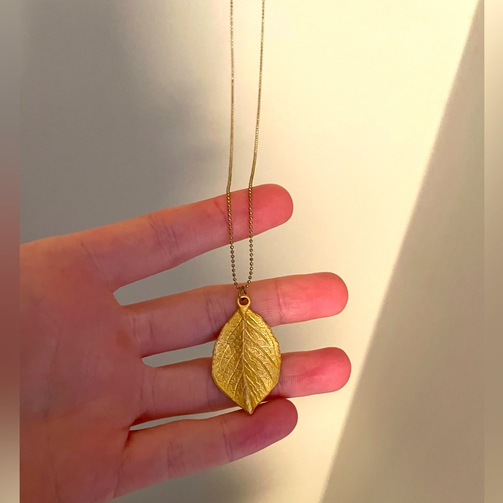Dainty gold leaf necklace from Anthropologie